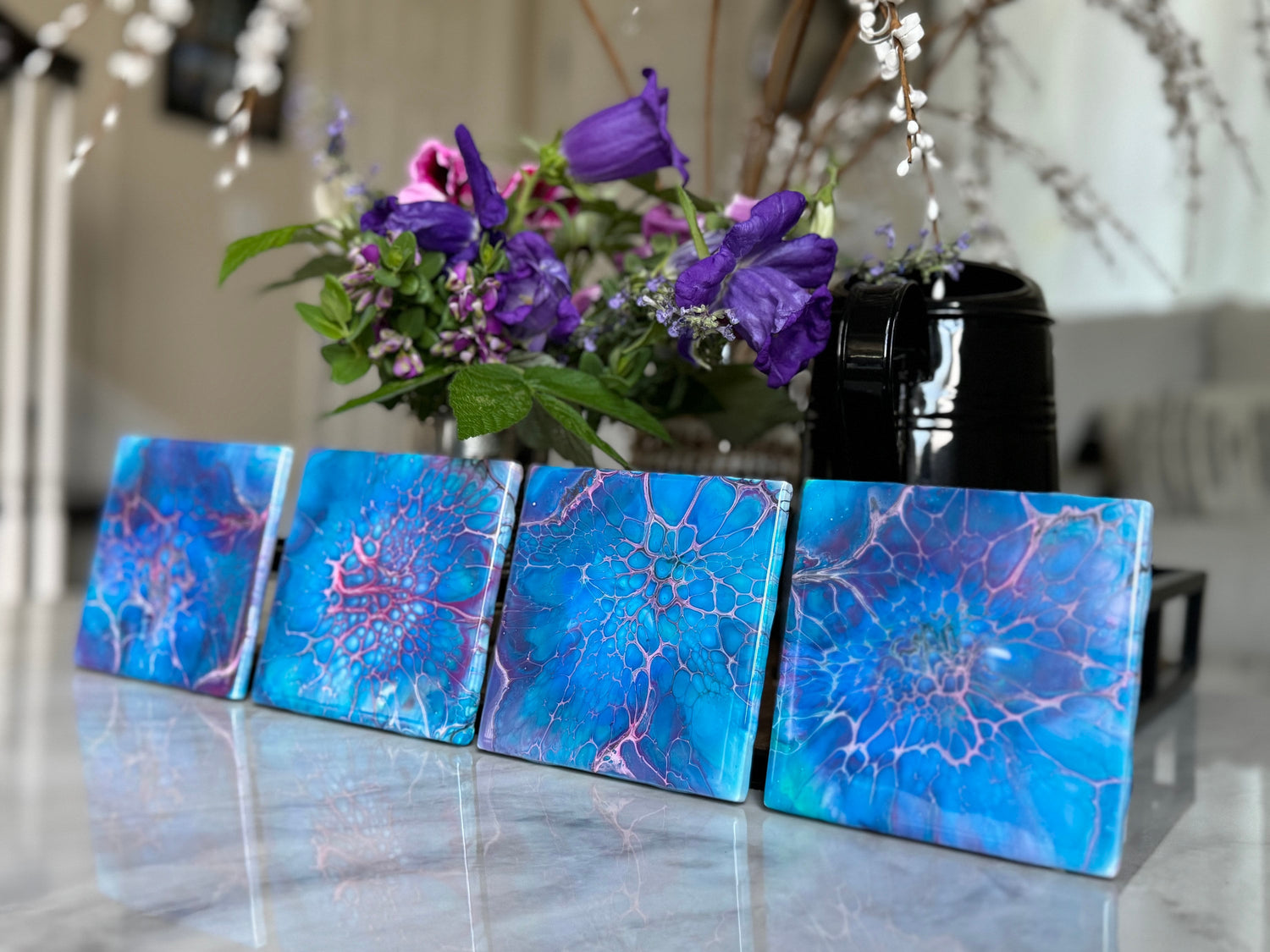 Hand painted 4 inch square coaster sets in various colors of green and blue.