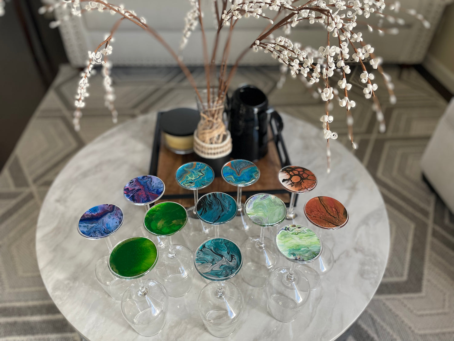 Painted wine glasses in various colors, with glossy epoxy seal. The base of the glass is the only area with paint color.