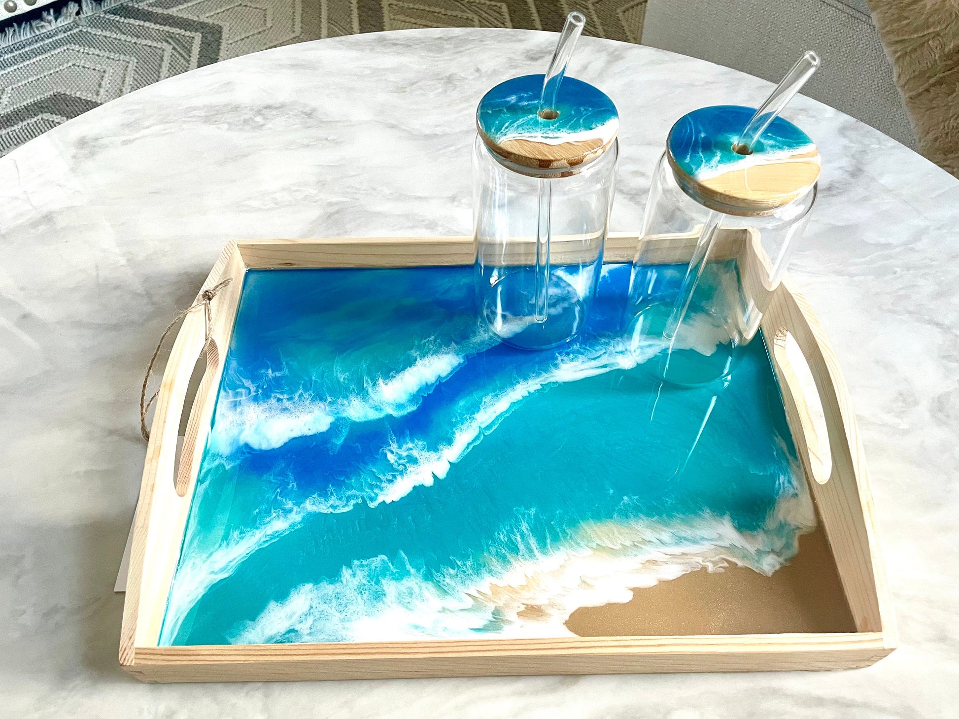 Resin Ocean Wave Drinking Glass with Bamboo Lid and Glass Straw for The Ocean Lover who wants that Coastal Vibe in home decor or bar ware.