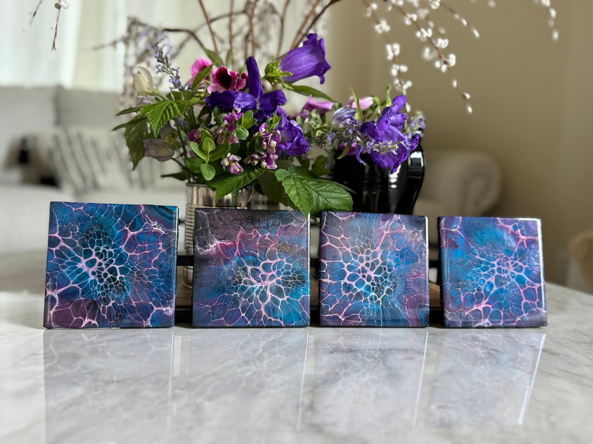 Decorative Handmade Ceramic Coasters in Blue and Purple. Paint Pour Drink Coasters are a great Housewarming Gift for any Home Decor.