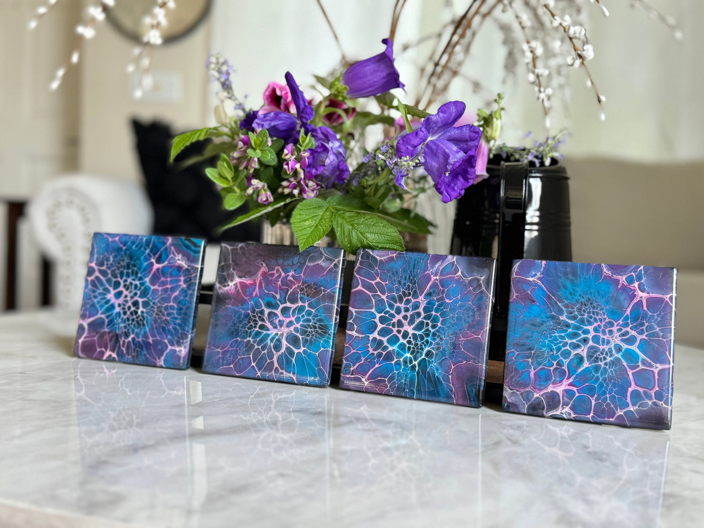 Decorative Handmade Ceramic Coasters in Blue and Purple. Paint Pour Drink Coasters are a great Housewarming Gift for any Home Decor.