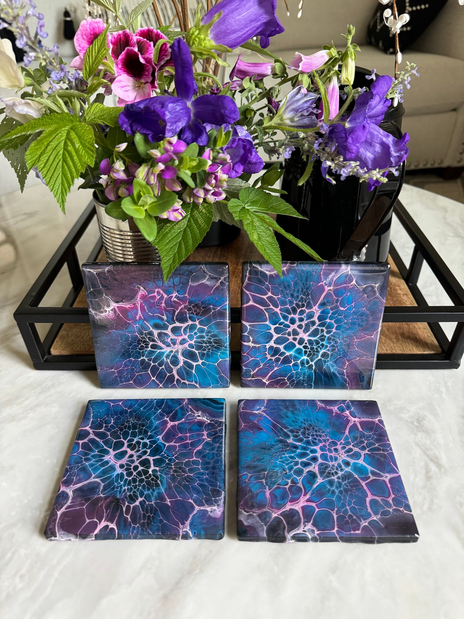 Decorative Handmade Ceramic Coasters in Blue and Purple. Paint Pour Drink Coasters are a great Housewarming Gift for any Home Decor.