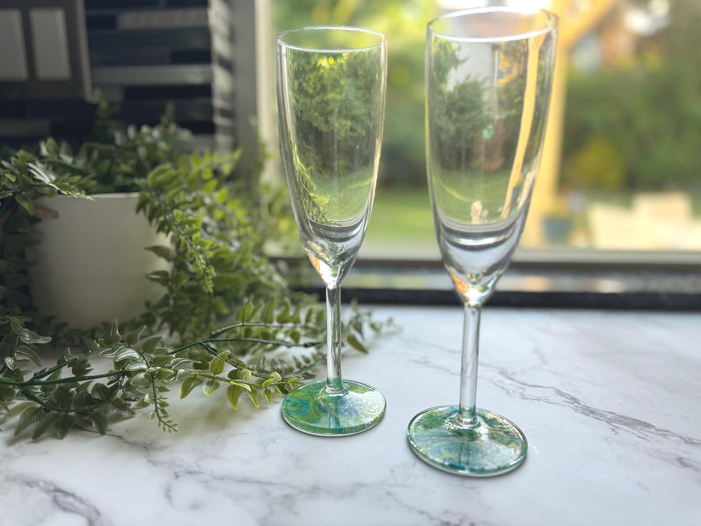 Celebrate in Style with this Set of Champagne Glasses! Perfect to Gift or to for a Special Event such as an Anniversary or Wedding Toast.